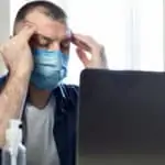 stressed man in mask